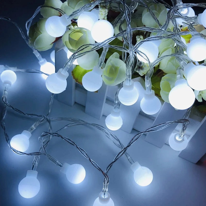 Elevate your space with these versatile 10M LED string lights. Featuring soft, ball-shaped bulbs, they create a warm, inviting ambiance for any occasion, indoors or out. Powered by USB or batteries, you have the flexibility to place them anywhere. Perfect