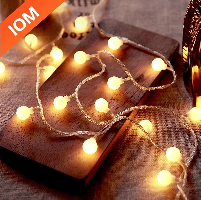 Elevate your space with these versatile 10M LED string lights. Featuring soft, ball-shaped bulbs, they create a warm, inviting ambiance for any occasion, indoors or out. Powered by USB or batteries, you have the flexibility to place them anywhere. Perfect
